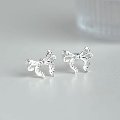 Women's bow 925 sterling silver earrings are fashionable, elegant and simple, suitable for daily commuting and dating